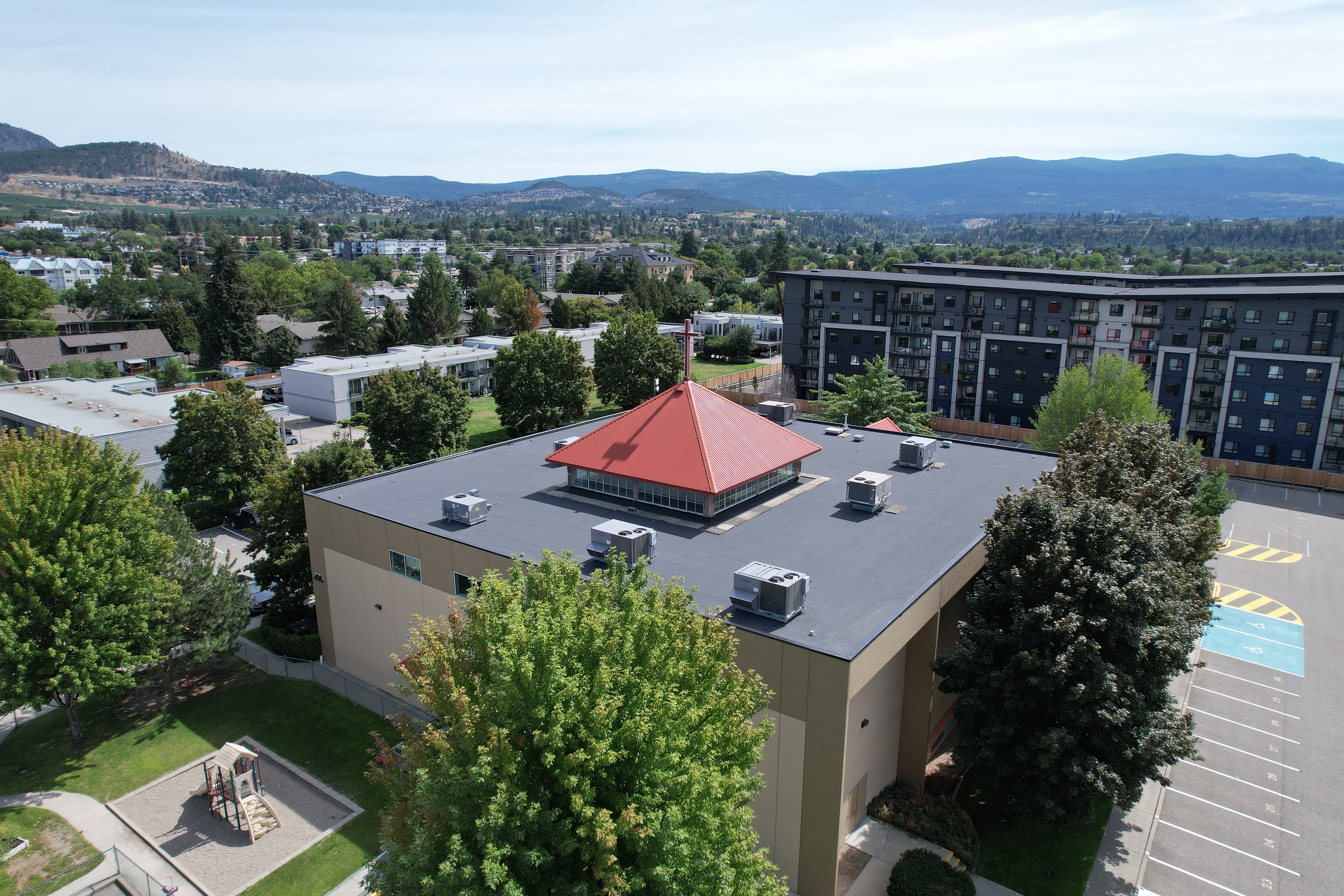 Flat torch-on roof on a large building, seen from above