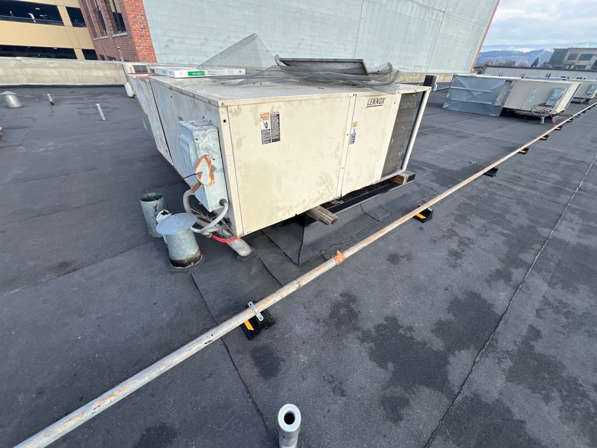 The same rooftop unit on the new torch-on roof