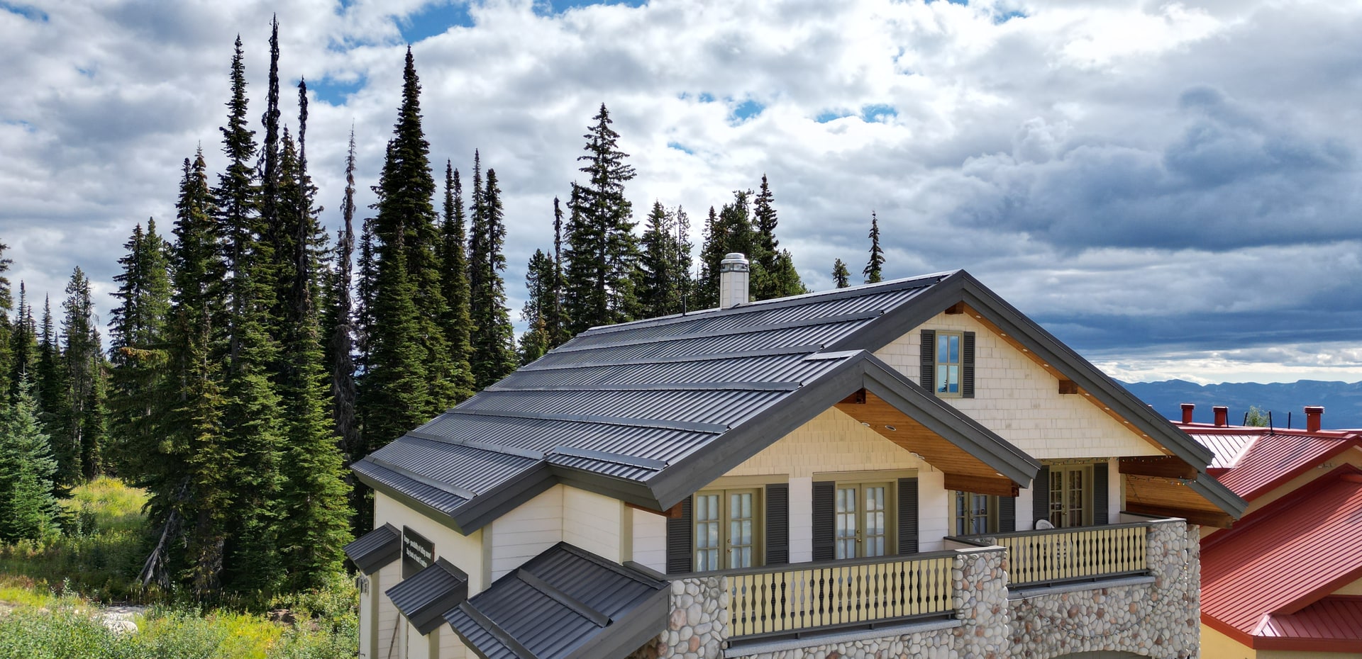 Metal roof on a mountain chalet in the snow
