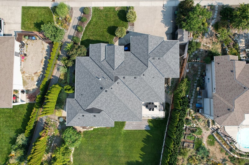 A house with a new architectural shingle roof, seen from straight above