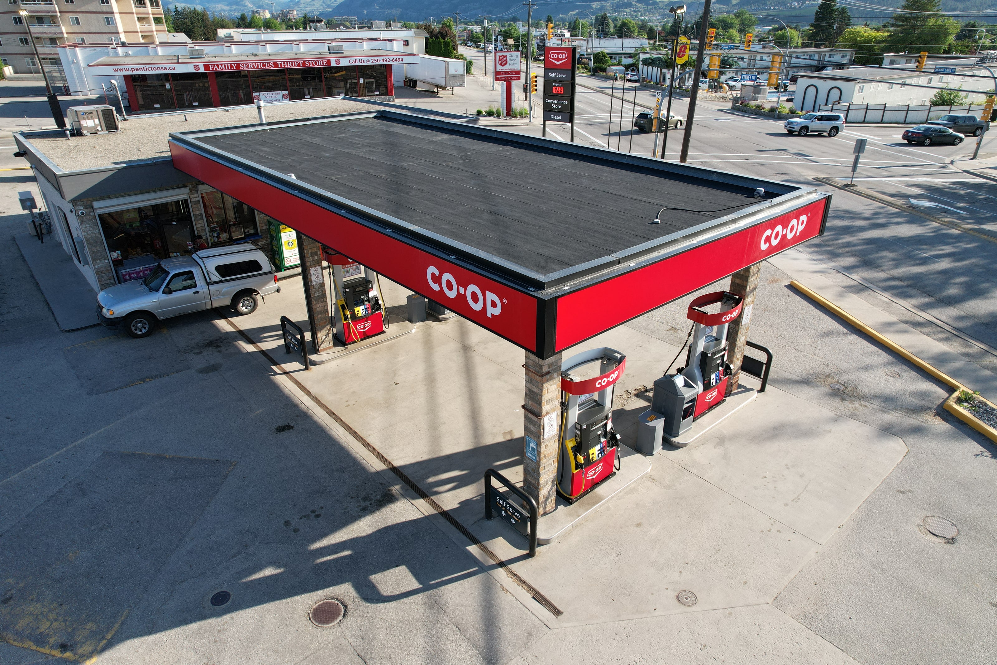 The gas station canopy from above with its new torch-on roof