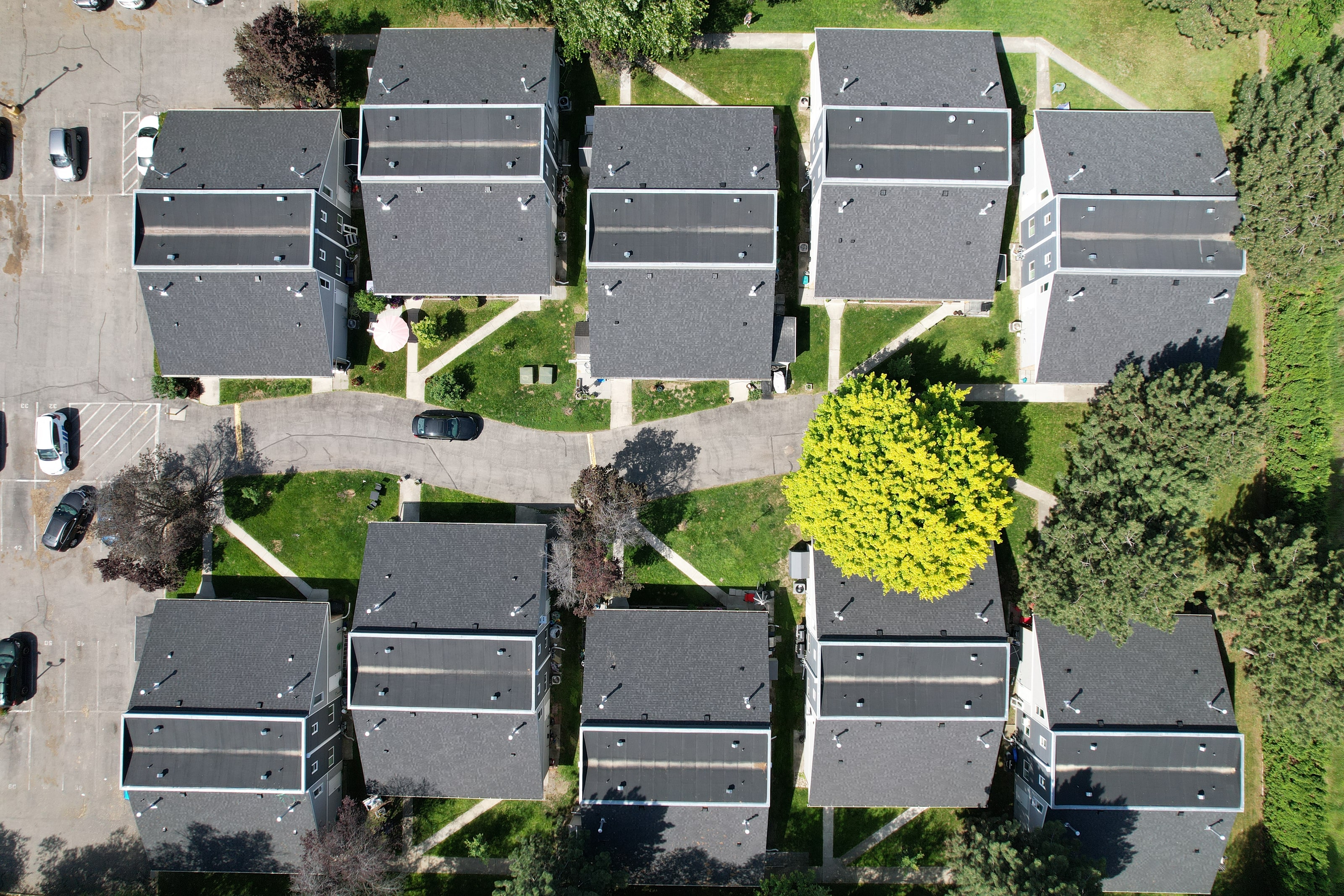 The townhome strata from straight above: new shingles and the flat tops